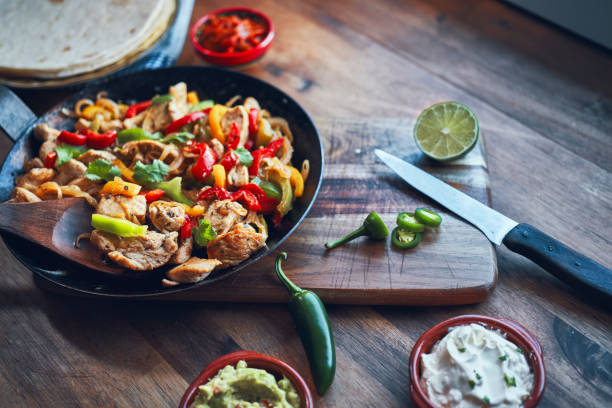 istock Fajitas de Pollo Chicken marinated Tortillas with Onions and Peppers 1282996564