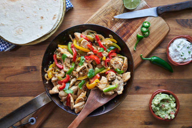 istock Fajitas de Pollo Chicken marinated Tortillas with Onions and Peppers 1282996567