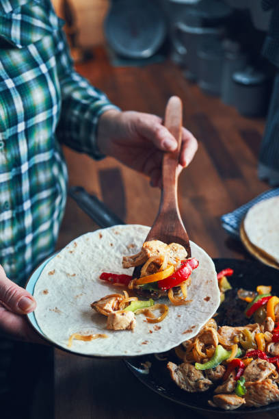 istock Fajitas de Pollo Chicken marinated Tortillas with Onions and Peppers 1282996597