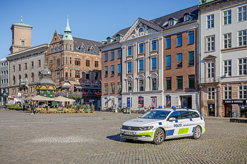 Nytorv, Copenhagen, Denmark, October 15, 2020: Police car parked in a central city square in the central part of Copenhagen