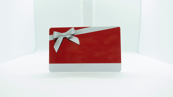 Empty or filled red and white gift card at white background