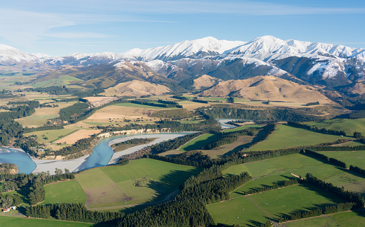 Flying up the Waimakariri River on New Zealand's South Island, heading for the snow-capped peaks of the Southern Alps.