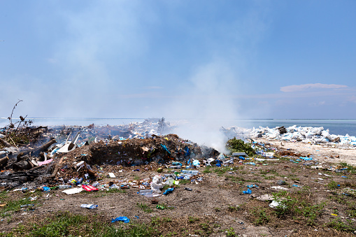 Dump on tropical island. Global pollution problem in the world