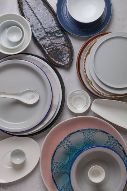 istock Many plates on a light background top view 1283002133