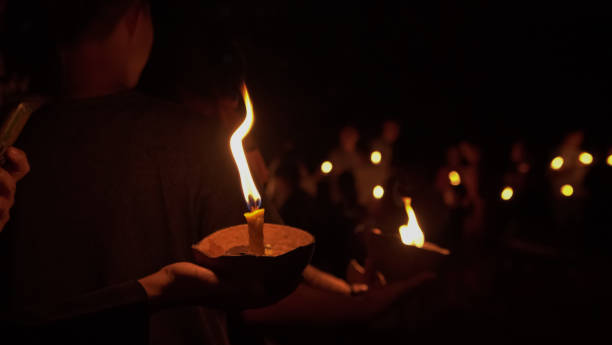istock Blur candles in the dark background. 1283005557