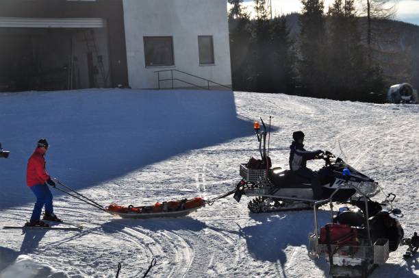 Rescue sleds outside the Rescue Base Ready for Emercency, in the alps near vienna Ski and Mountain Rescue Team checking Equipment on Base Station in Semmering in the alps near Vienna ski resort flash stock pictures, royalty-free photos & images