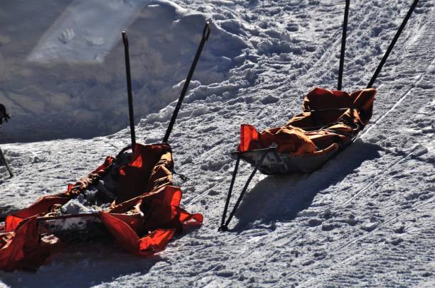 Rescue sleds outside the Rescue Base Ready for Emercency, in the alps near vienna Ski and Mountain Rescue Team checking Equipment on Base Station in Semmering in the alps near Vienna ski resort flash stock pictures, royalty-free photos & images