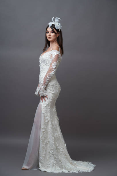 istock Beautiful young bride in wedding dress with veil 1283014704