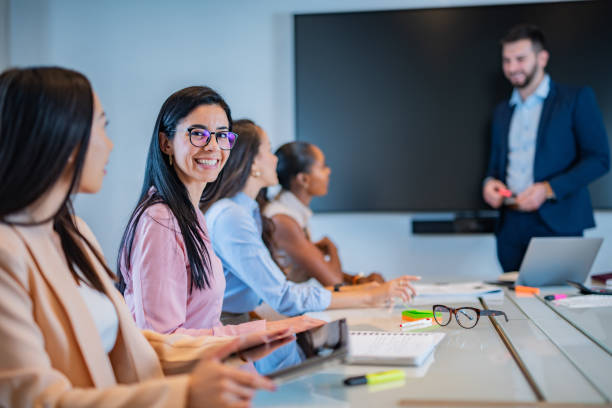 istock Young woman at business presentation. 1283016093