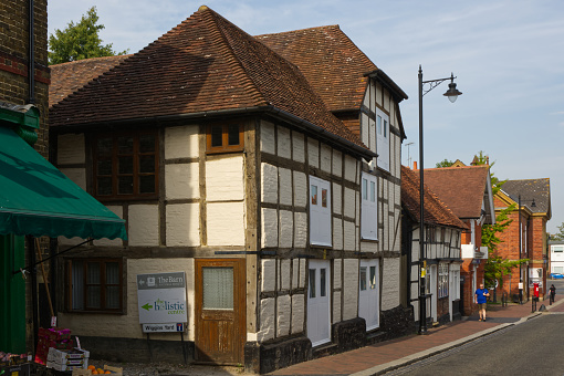 Mixed architecture of old buildings in shopping street, Godalming, Surrey, England