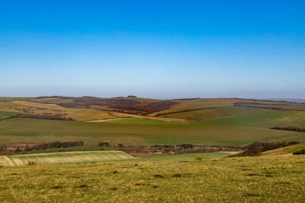 istock A Rural South Downs Landscape, with a Blue Sky Overhead 1283017427