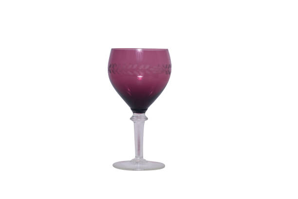 istock retro magenta's glass cup on a white background. 1283018130