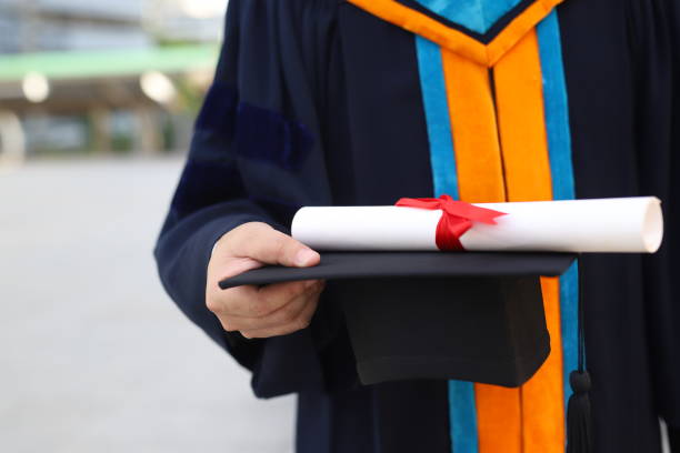Learners who have graduated from a university school and received a diploma. stock photo