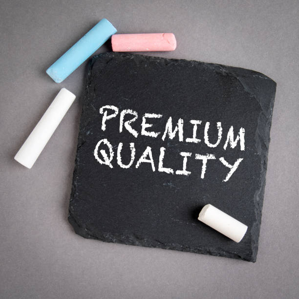 istock PREMIUM QUALITY. Abstract business concept. Text on a stone surface 1283022352