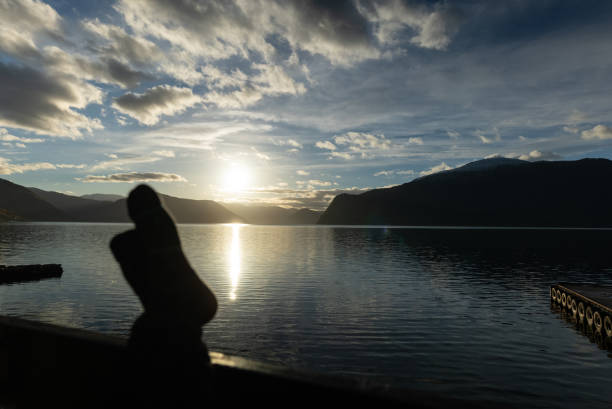 istock Relaxing by a fjord in mountain 1283022613