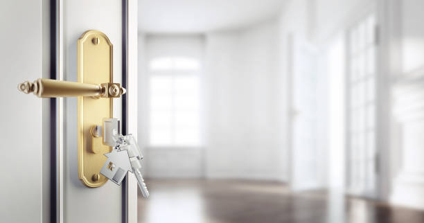 istock Open Door with Key to apartment 1283022807