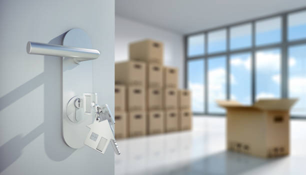istock Open Door with Key to Apartment 1283023733