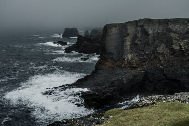 istock Eshaness cliffs, north of Shetland Islands 1283024499