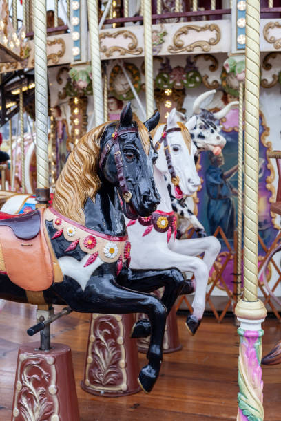 istock Merry go round carousel with horses 1283026017