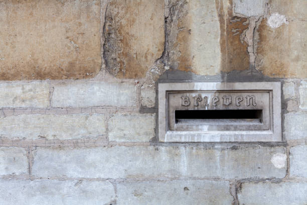 istock Old stone mailbox in the centre of Bruges 1283026126
