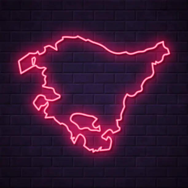 Vector illustration of Basque Country map - Glowing neon sign on brick wall background