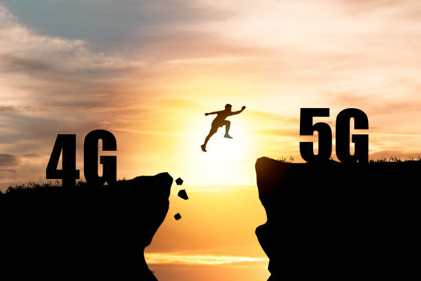 istock Silhouette Human jumping from 4G cliff to 5G cliff with cloud sky and sunset. Technology change and transformation concept. 1283028880