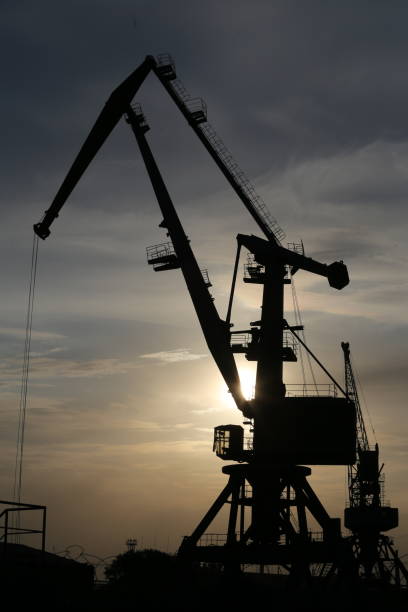 istock Port crane for work in the sunset 1283029046