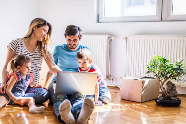 istock Family moving into new home 1283029902