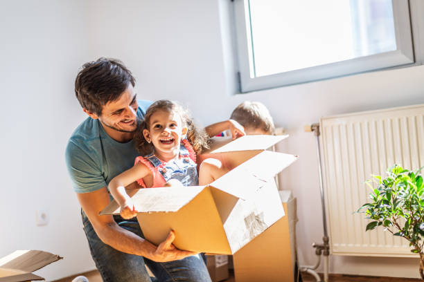 istock Playful family into new home 1283030183