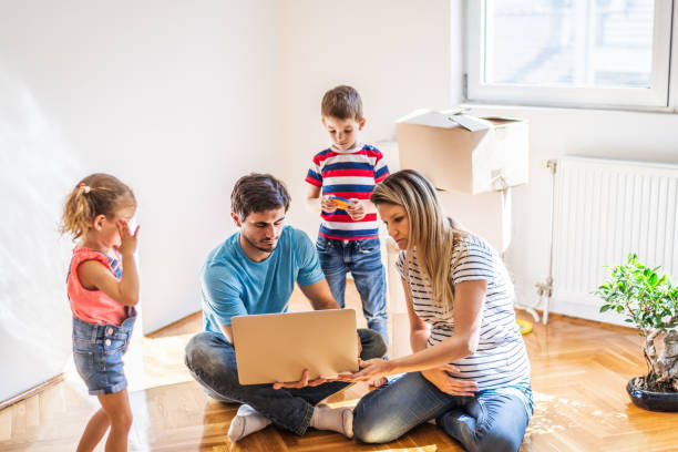 istock Family moving into new home 1283030319
