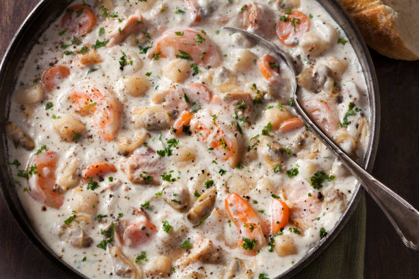 istock Seafood Chowder with Shrimp, Bay Scallops, Clams and Salmon 1283033186
