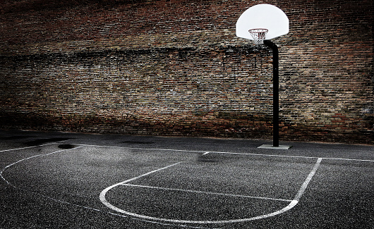 Basketball hoop in urban setting downtown city hood