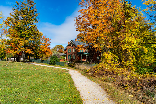 The historic farmhouse is opened to tourists visiting in Bronte Creek Provincial Park in Autumn, Oakville, Canada.\n\nThe property location is in Bronte Creek Provincial Park.\nPark address: 1219 Burloak Dr, Oakville, ON L6M 4J7\nThe coordinates of the property: 43.407449, -79.749373