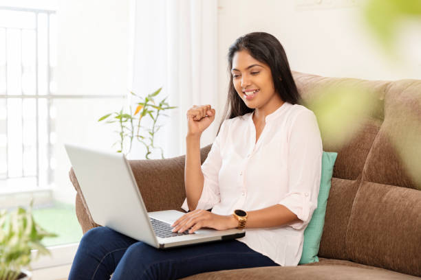 istock Cheerful pretty Young woman working in laptop 1283041525