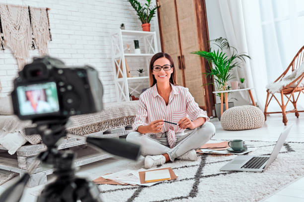 istock A woman works, conducts live broadcasts from home on the Internet. 1283045469