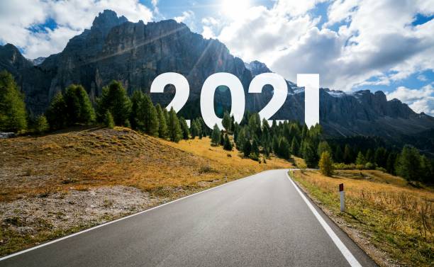 istock 2021 New Year road trip travel and future vision concept . 1283045683