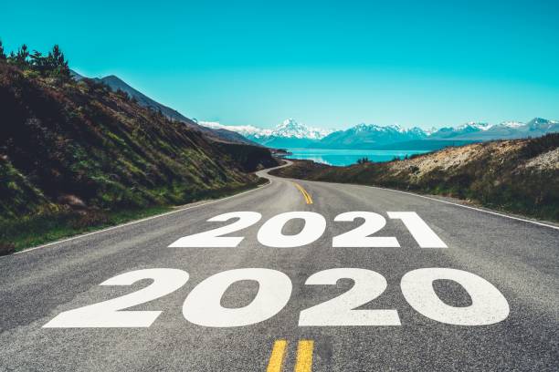 istock 2021 New Year road trip travel and future vision concept . 1283045797