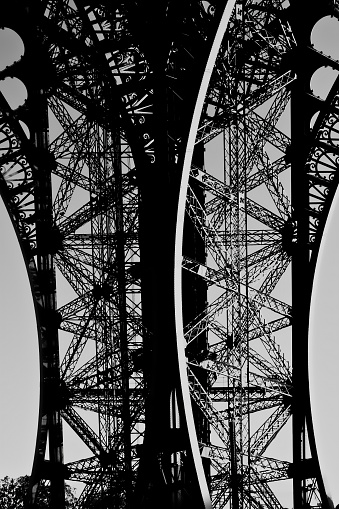Detail of the iron structure of the Eiffel Tower, in Paris, France. Bl in Paris, IDF, France