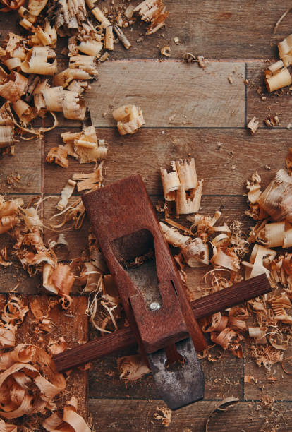 istock A hand planer and wood shavings on the tile floor 1283048454