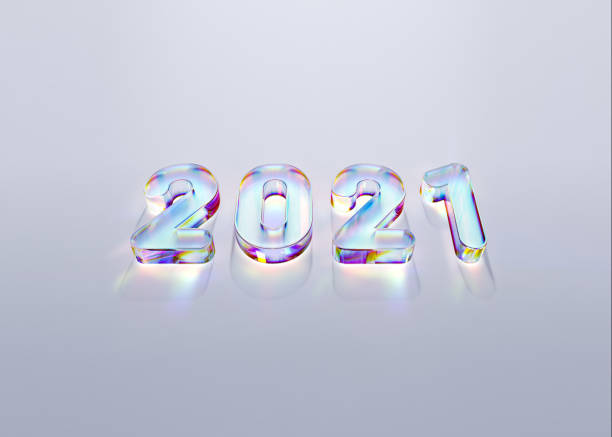 istock New year 2021 celebration. Modern style caustic effect crystals 3d numeral 2021 on white background. 3D rendering 1283048868