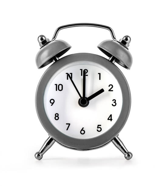 istock Gray retro alarm clock on isolated 1283049846