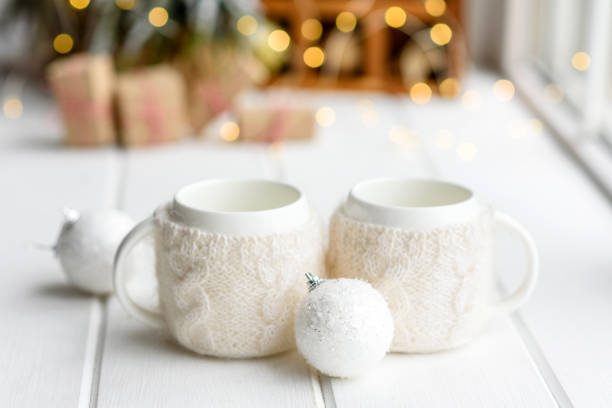 istock Beautiful multi-colored Christmas decorations on a light wooden table 1283051573