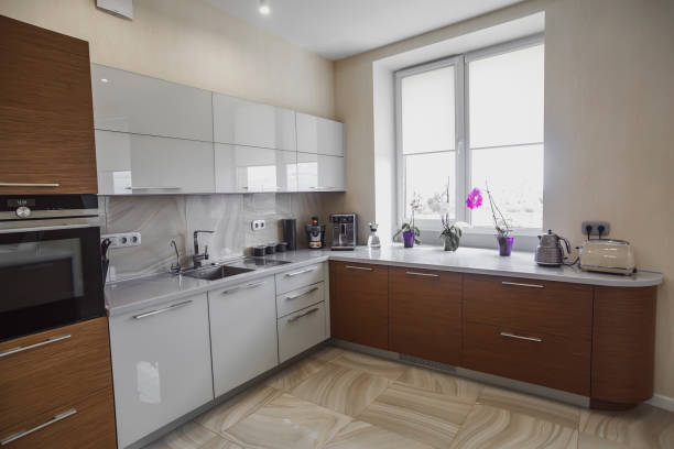 istock View of luxury modern fitted kitchen with stainless steel appliances 1283059123
