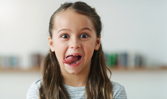 Cropped shot of a little girl making silly faces