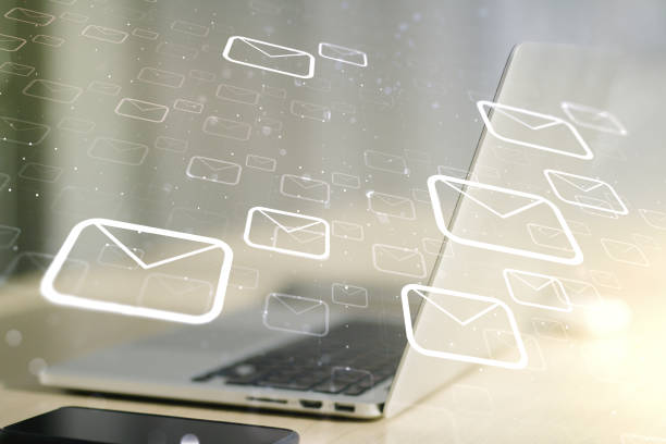 istock Creative abstract postal envelopes sketch on modern laptop background, e-mail and marketing concept. Double exposure 1283061715