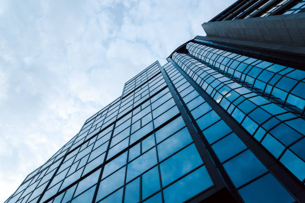 istock Unrecognizable modern office building exterior stock photo. 1283061954