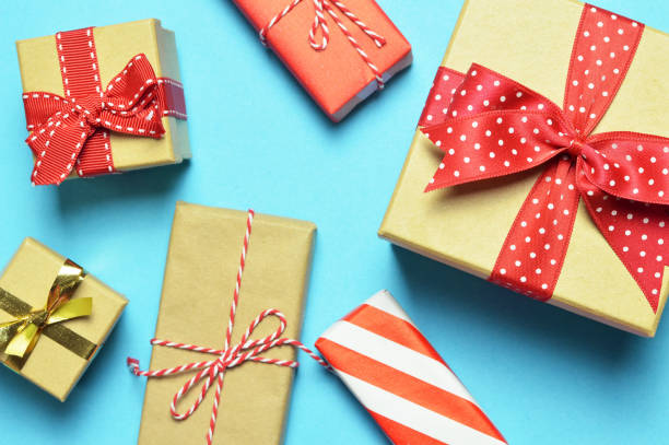 istock Christmas gifts on pastel blue background 1283062929