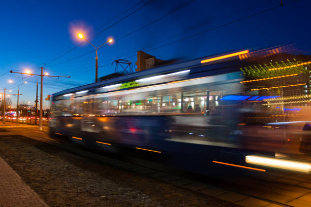 istock The motion blurred tram in the evening. 1283064006