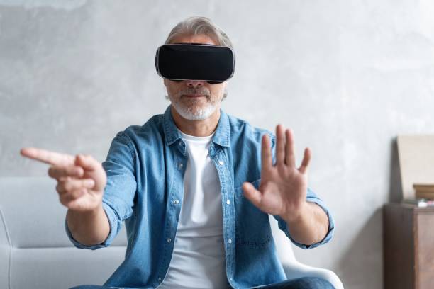 istock Handsome man trying vr glasses at home. 1283064184