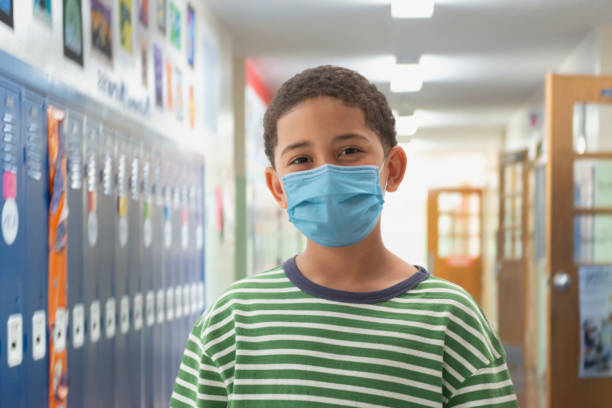 istock Young student wearing protecting mask covid 19 1283066613